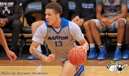 Barton men's basketball player Anthony Atkinson-Enneking dribbles to the basket.