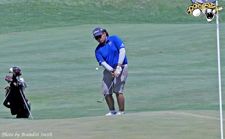 Barton men's golfer Tanapoom Kaewjoey with a chip